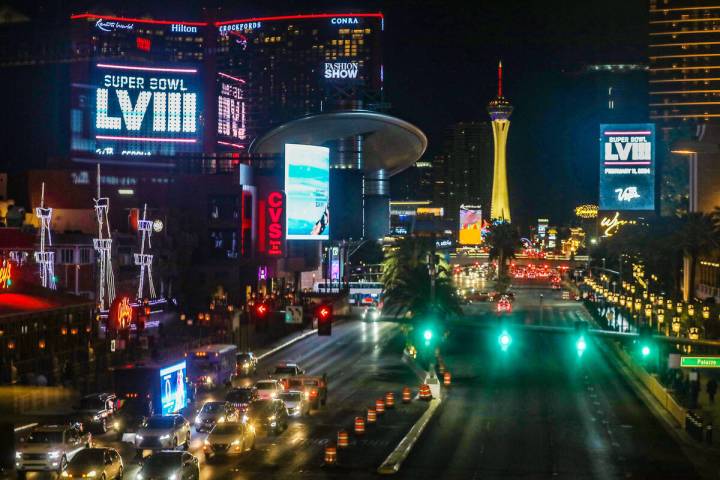 Marquees along the Strip show the announcement that Super Bowl III will be held in Las Vegas on ...