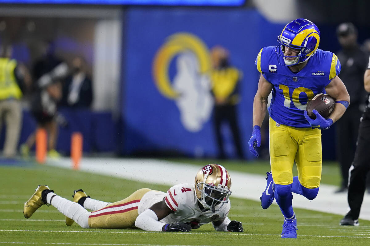 Los Angeles Rams' Cooper Kupp (10) gets past San Francisco 49ers' Emmanuel Moseley during the s ...