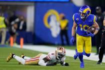 Los Angeles Rams' Cooper Kupp (10) gets past San Francisco 49ers' Emmanuel Moseley during the s ...