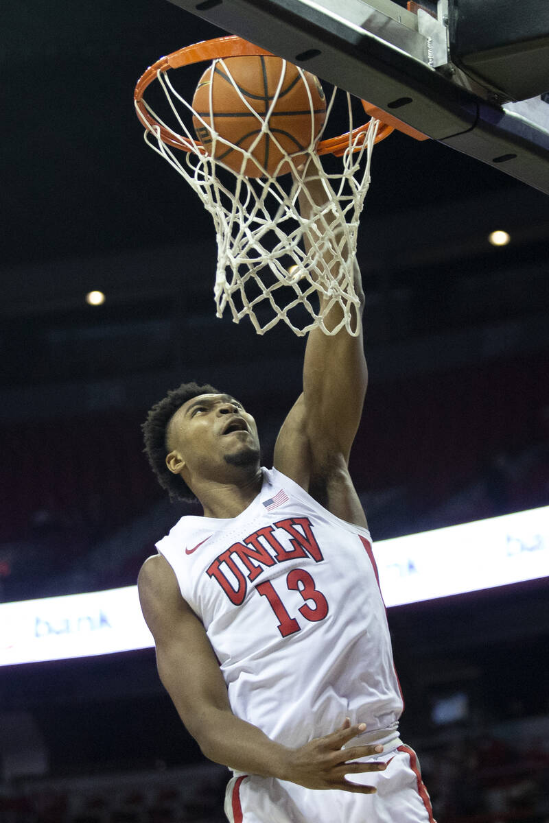 UNLV Rebels guard Bryce Hamilton (13) dunks against Air Force Falcons during the second half of ...