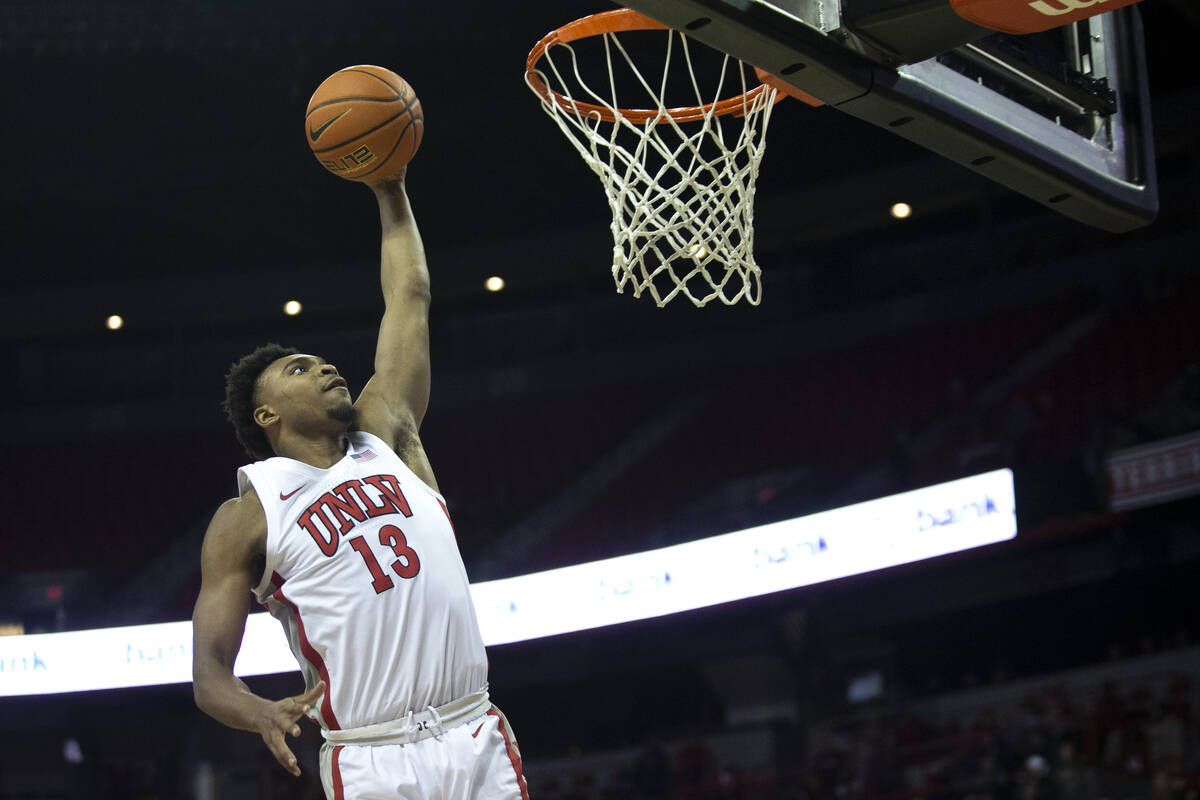 UNLV Rebels guard Bryce Hamilton (13) jumps to dunk against the Air Force Falcons during the se ...