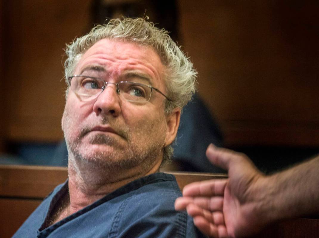 A marshal motions to Michael Banco, 55, appears in Clark County Justice Court in 2015. (Las Ve ...