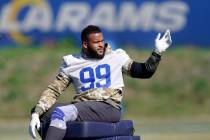 Los Angeles Rams defensive end Aaron Donald sits prior to practice for an NFL Super Bowl footba ...