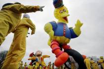 The Sesame Street Big Bird balloon sways in the wind during the annual Thanksgiving Day Parade ...