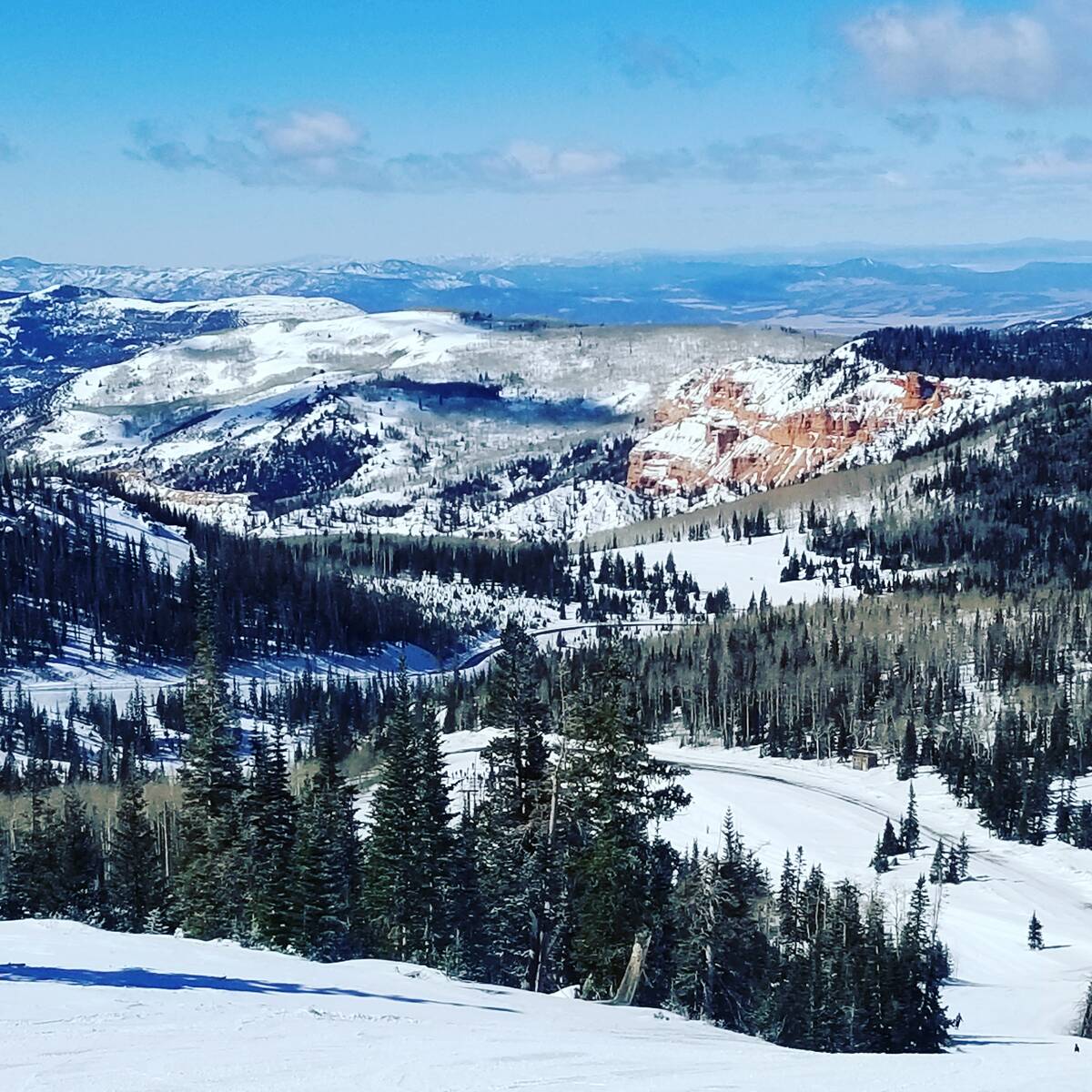 Part of the magic of skiing at Brian Head are views of the red rocks that make Utah a sought-af ...