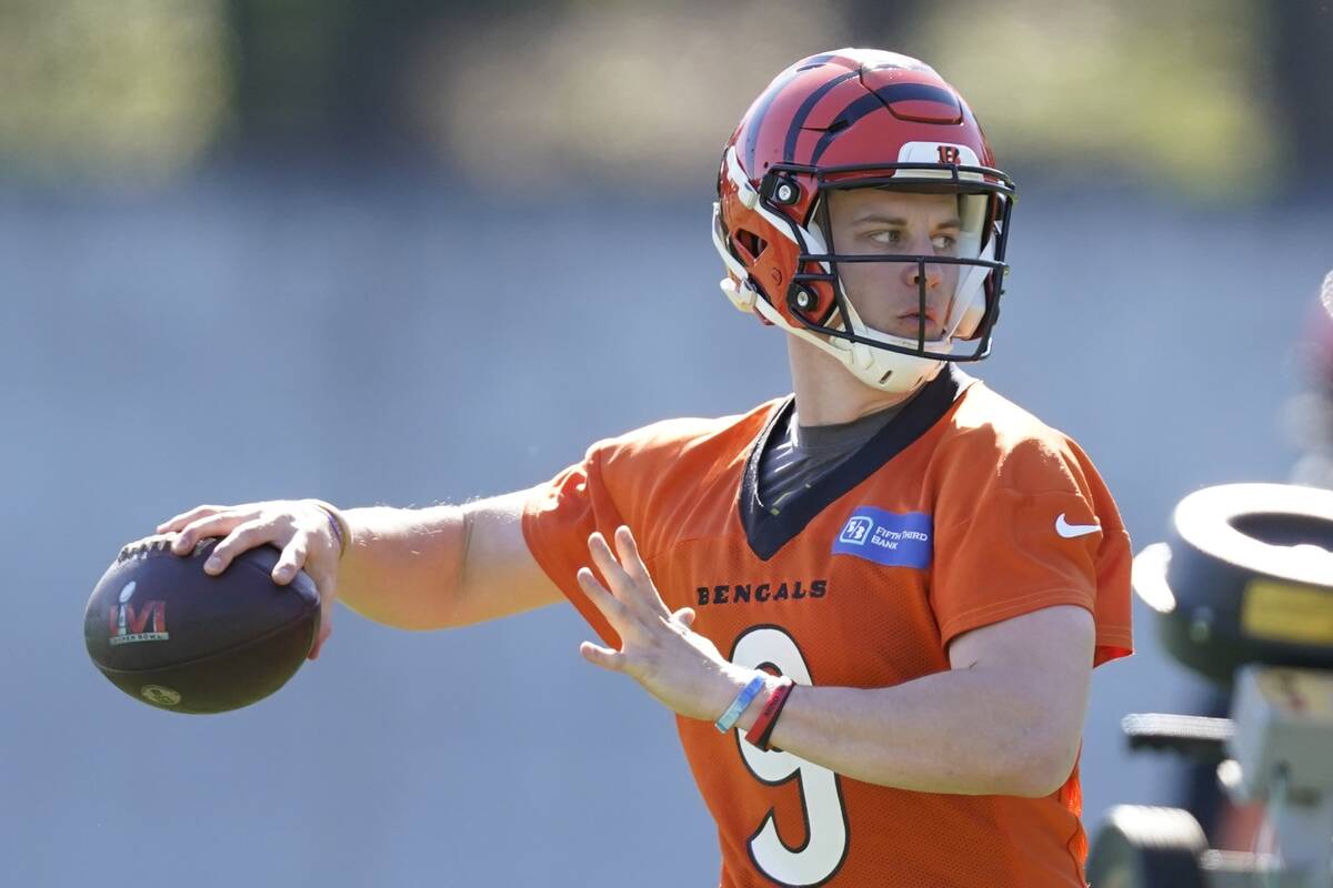 Cincinnati Bengals' Joe Burrow thorws during practice Thursday, Feb. 10, 2022, in Los Angeles. ...