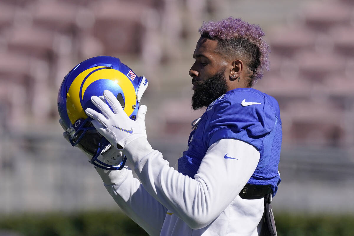 Los Angeles Rams wide receiver Odell Beckham Jr. puts on his