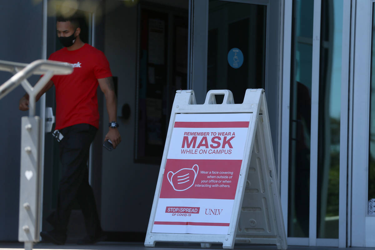 A signs reminds people to wear a mask at UNLV in Las Vegas, Friday, Sept. 4, 2020. (Erik Verduz ...