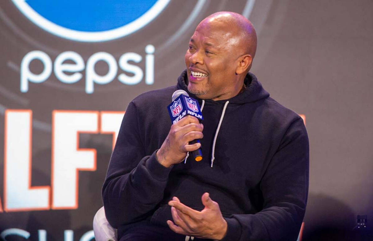 Hip-hop icon Dr. Dre laughs during the Super Bowl 56 halftime news conference at the Los Angele ...