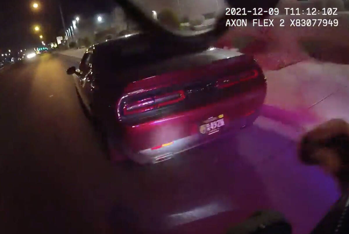 This screenshot from Las Vegas police body camera video shows Gary Dean Robinson's Dodge Challe ...