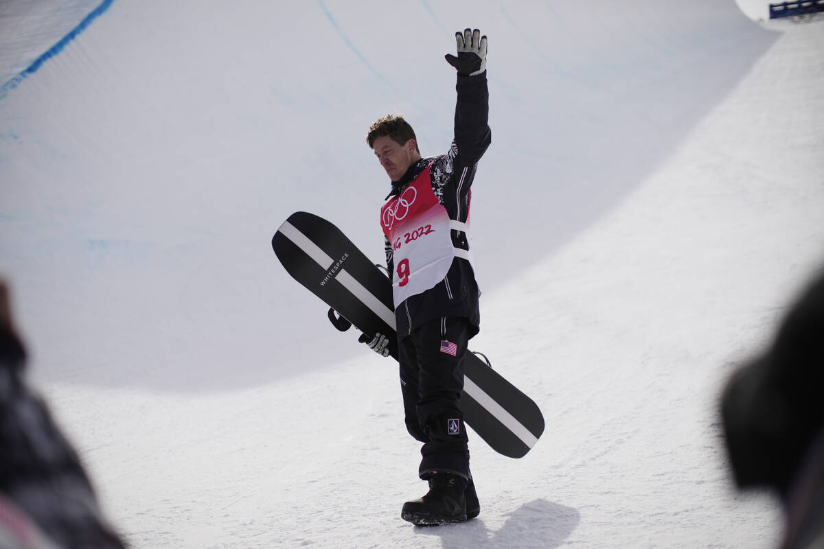 United States' Shaun White waves in the halfpipe course after the men's halfpipe finals at the ...
