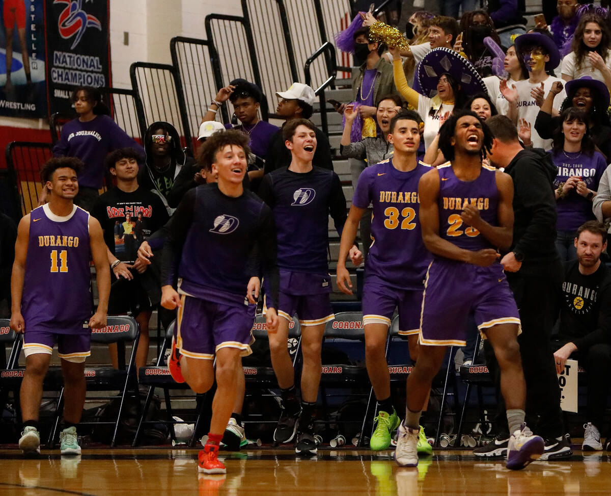 Durango High School players celebrate their victory against Coronado High School after the over ...