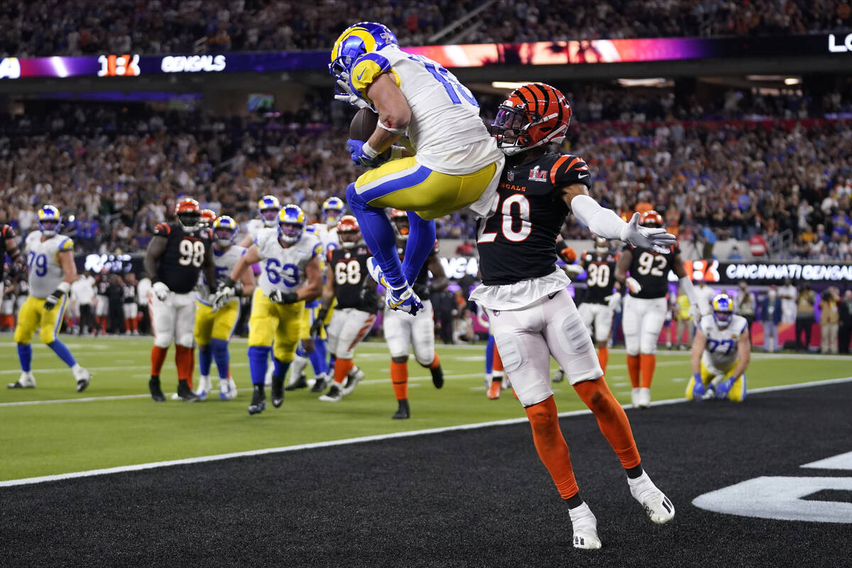Los Angeles Rams wide receiver Cooper Kupp, top, catches a touchdown against Cincinnati Bengals ...