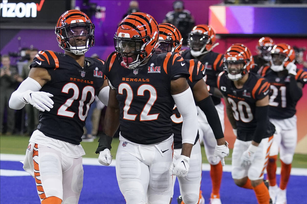 Cincinnati Bengals cornerback Chidobe Awuzie (22) celebrates after an interception against the ...