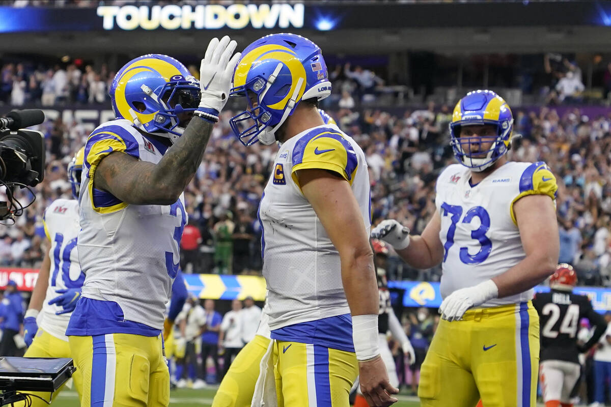 Los Angeles Rams wide receiver Odell Beckham Jr., left, celebrates with teammates after scoring ...