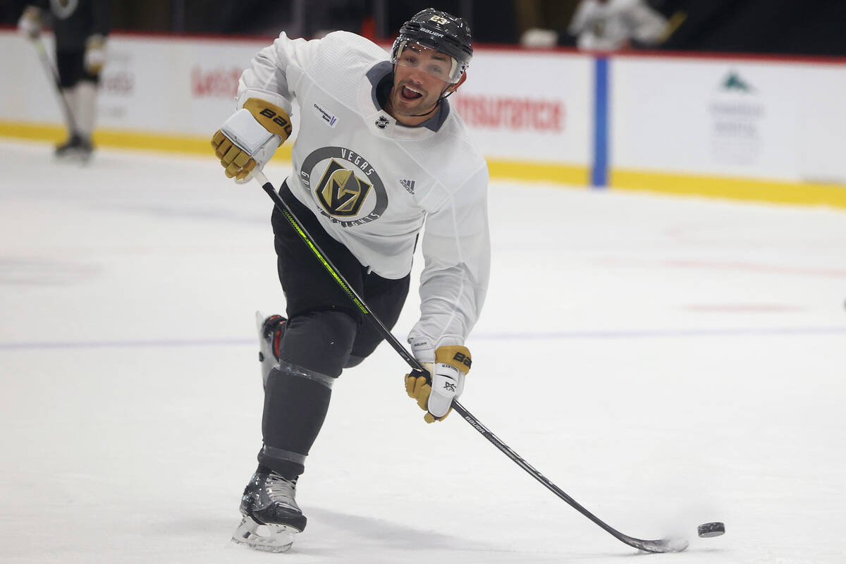 Vegas Golden Knights defenseman Alec Martinez (23) takes a shot at the ...