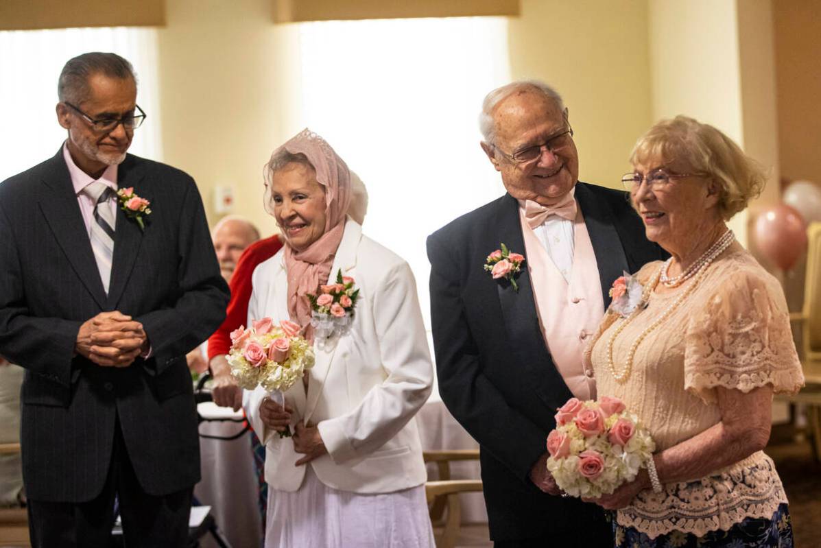 Couples, from left, Benjamin Saez and Isabel Saez, and Jim Barben and Goldie Barben, participat ...