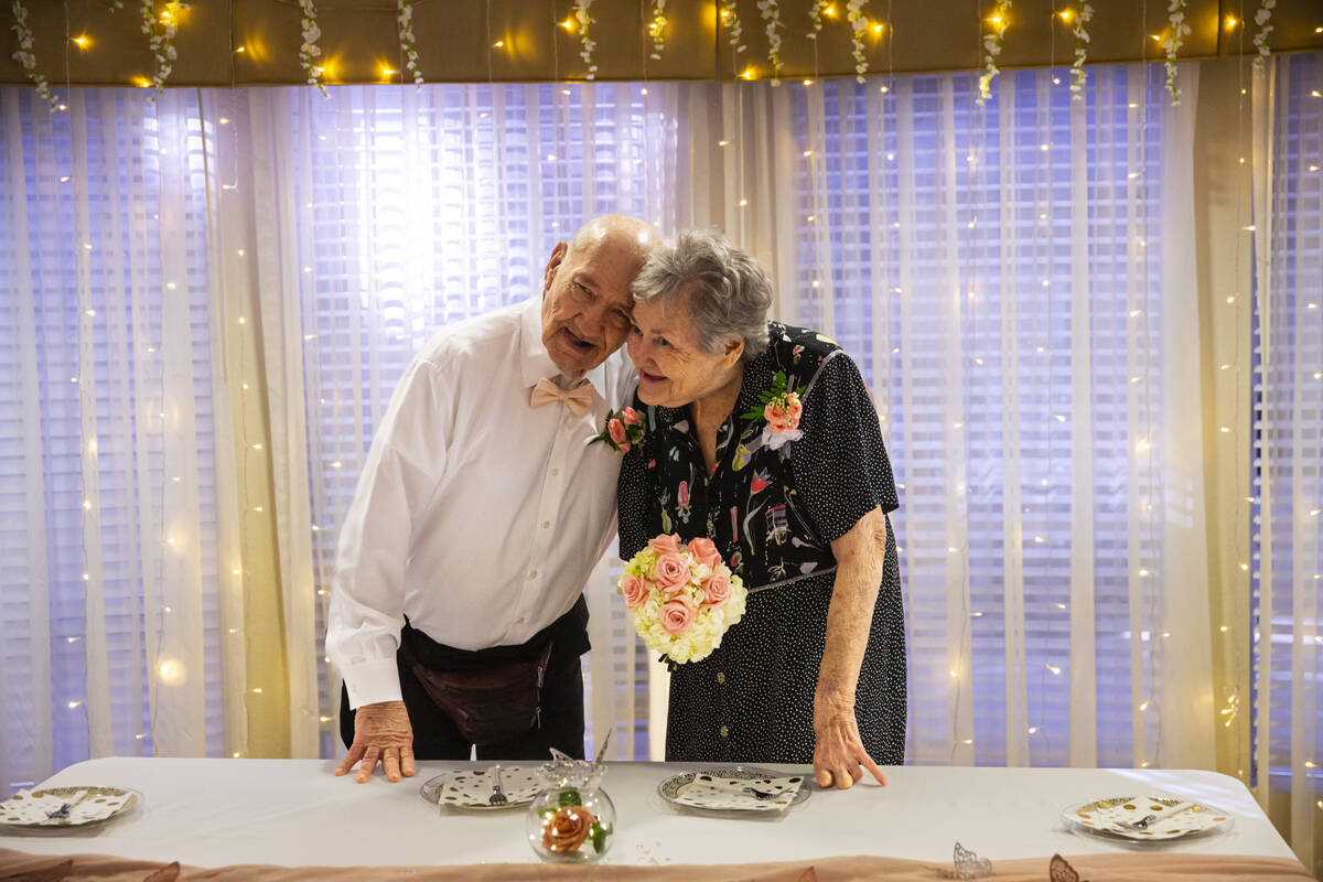 David Bauer and Edith Vines-Bauer pose for a portrait during a group vow renewal ceremony on Va ...