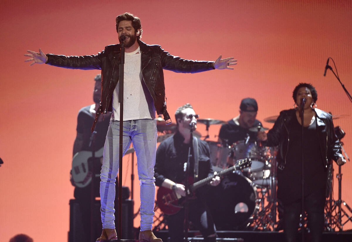 Thomas Rhett performs "Look What God Gave Her" at the 54th annual Academy of Country ...
