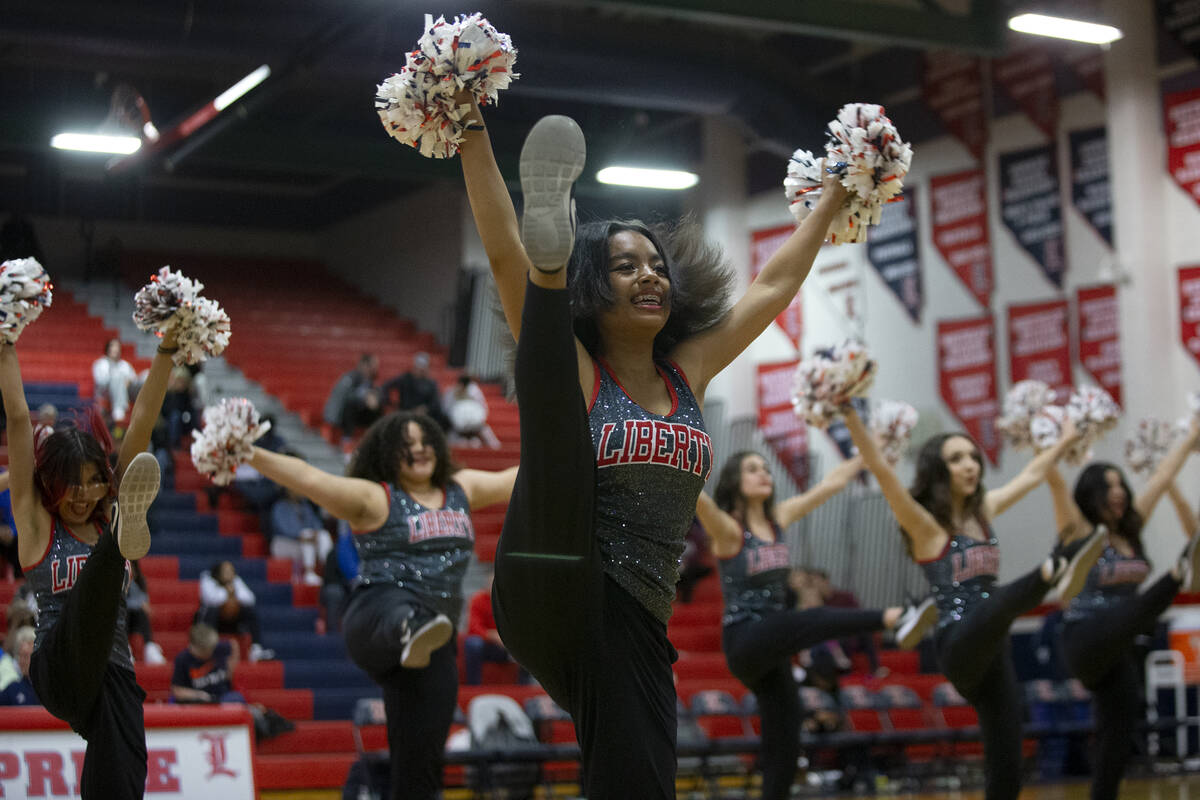 Liberty’s dance team performs at halftime during a high school Southern Region tournamen ...