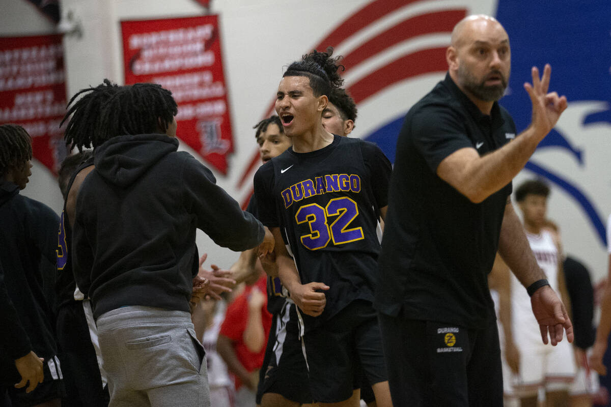 Durango’s Sterling Knox (32) celebrates with teammates during a high school Southern Reg ...