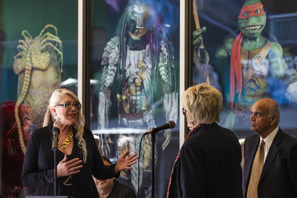 Tiana Armstrong, co-owner of The Movie Prop Experience, talks with Las Vegas Mayor Carolyn Good ...