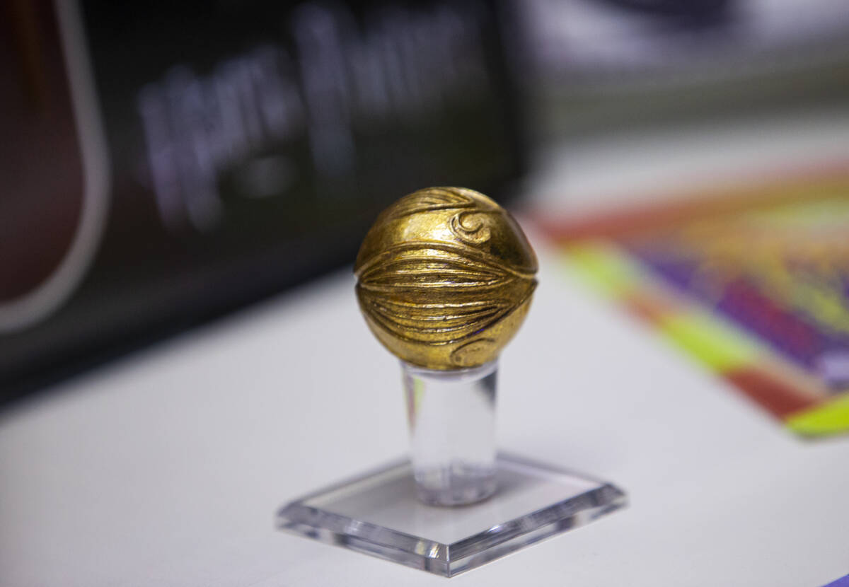 Props from the “Harry Potter” movies, including a golden snitch from “Harr ...