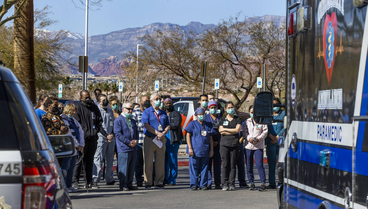 Attendees listen to words of support and encouragement during a nondenominational city wide pra ...