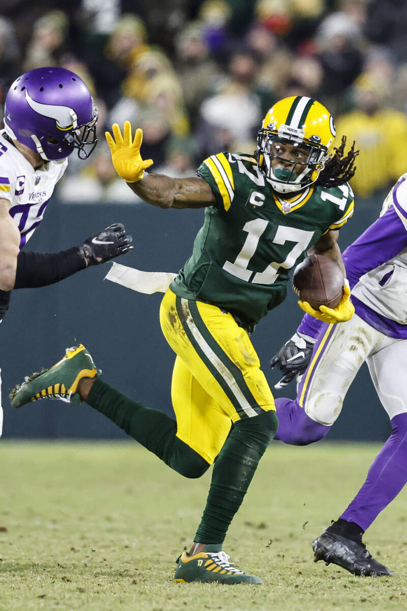 Green Bay Packers wide receiver Davante Adams (17) runs after a catch during an NFL football ga ...