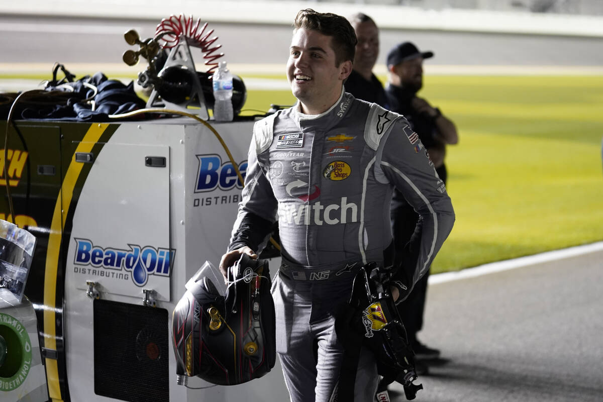 Noah Gragson walks to his car during qualifying for the NASCAR Daytona 500 auto race Wednesday, ...