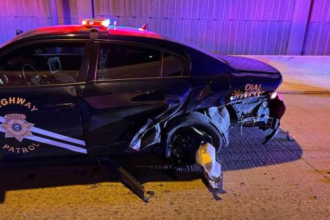 A driver was arrested on suspicion of impairment after crashing into a Nevada Highway Patrol Ve ...