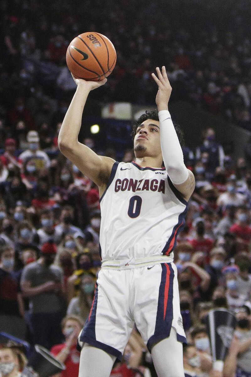 Gonzaga guard Julian Strawther shoots during the first half of an NCAA college basketball game ...