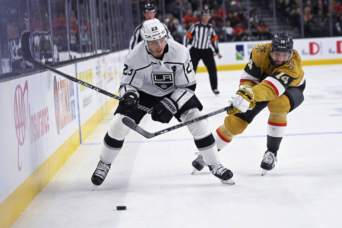 Los Angeles Kings right wing Dustin Brown (23) and Vegas Golden Knights defenseman Nicolas Hagu ...
