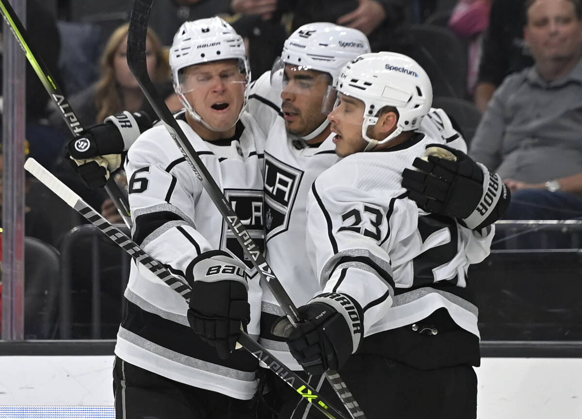 Los Angeles Kings defenseman Olli Maatta (6), center Andreas Athanasiou (22) and right wing Dus ...