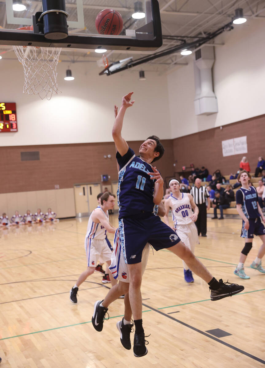 Adelson’s Michael Cohen (11) shoots against Green Valley Christian in the third quarter ...