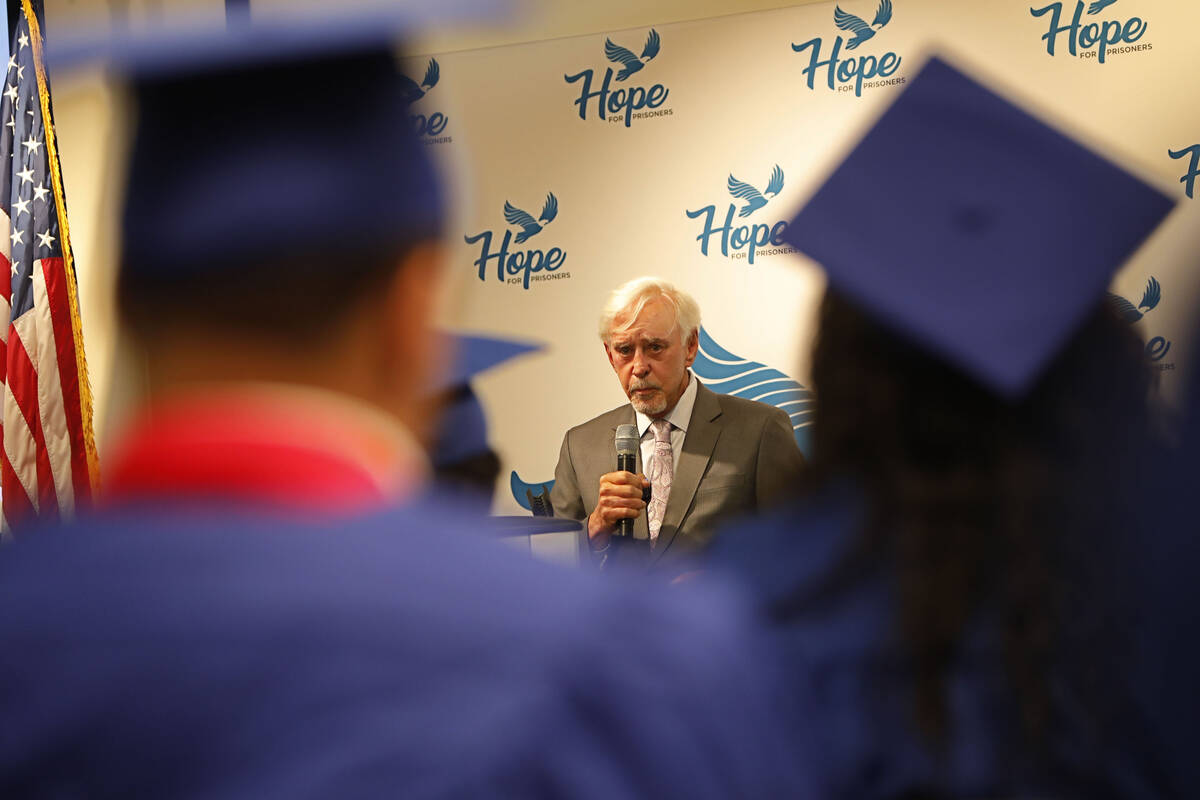 Billy Walters, center, speaks at a graduation ceremony of HOPE for Prisoners at the Metropolita ...