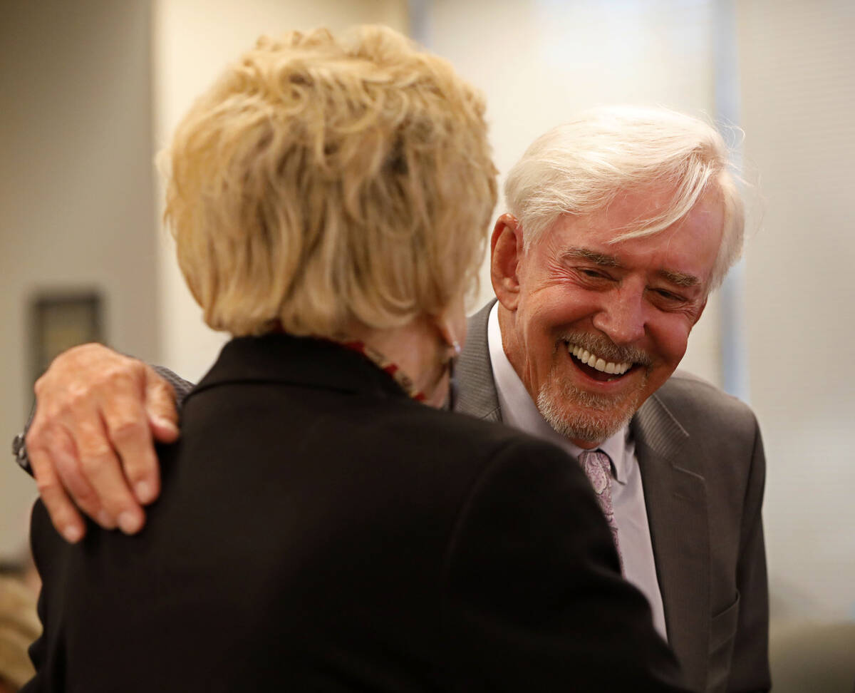 Billy Walters talks with Las Vegas Mayor Carolyn Goodman before a graduation ceremony of HOPE f ...