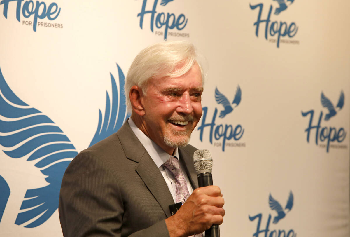 Billy Walters, center, speaks at a graduation ceremony of HOPE for Prisoners at the Metropolita ...