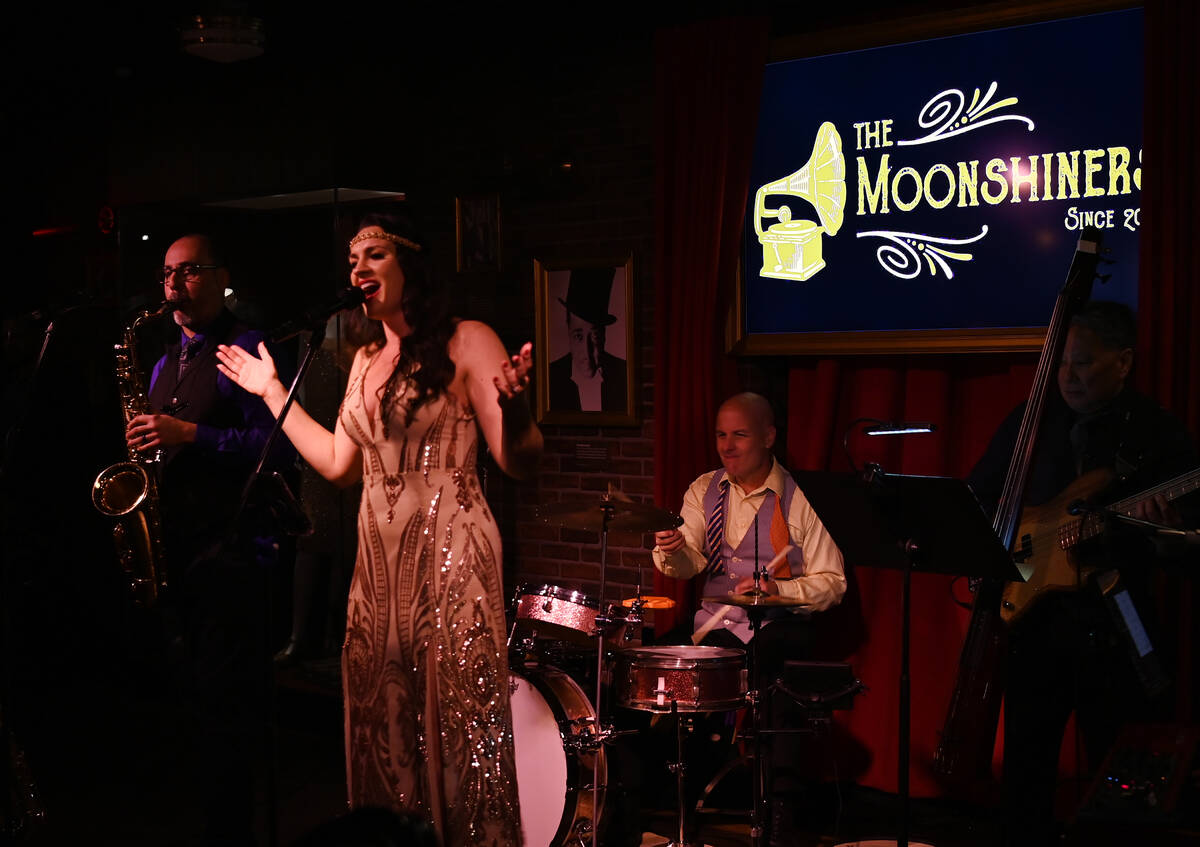 Musical group The Moonshiners perform at The Mob Museum's 10th Anniversary Fundraising Undercov ...