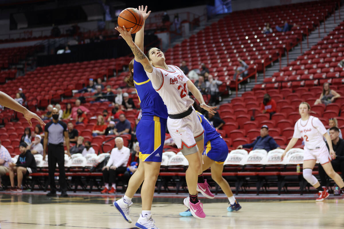 UNLV Lady Rebels Essence Booker (24) goes up for a shot against the San Jose Spartans in the se ...