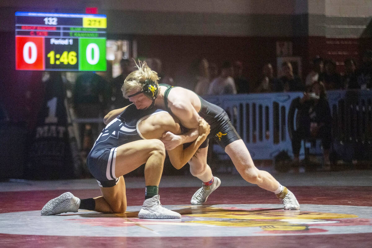 Bishop Manogue’s Carter Tate, right, wrestles SLAM Nevada’s Tyler Kaahanui, in th ...
