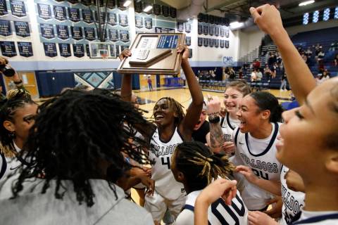 Centennial High School's Mary McMorris (4) and her teammates celebrate their victory against Sp ...