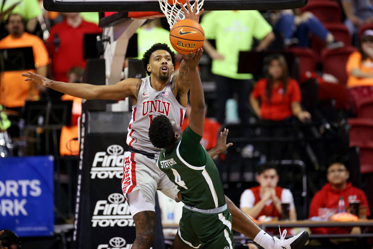 UNLV’s Royce Hamm Jr. (14) defends against Colorado State’s Isaiah Stevens (4) in ...
