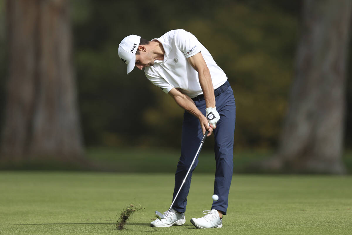 Joaquin Niemann, of Chile, hits his second shot on the 13th hole during the final round of the ...