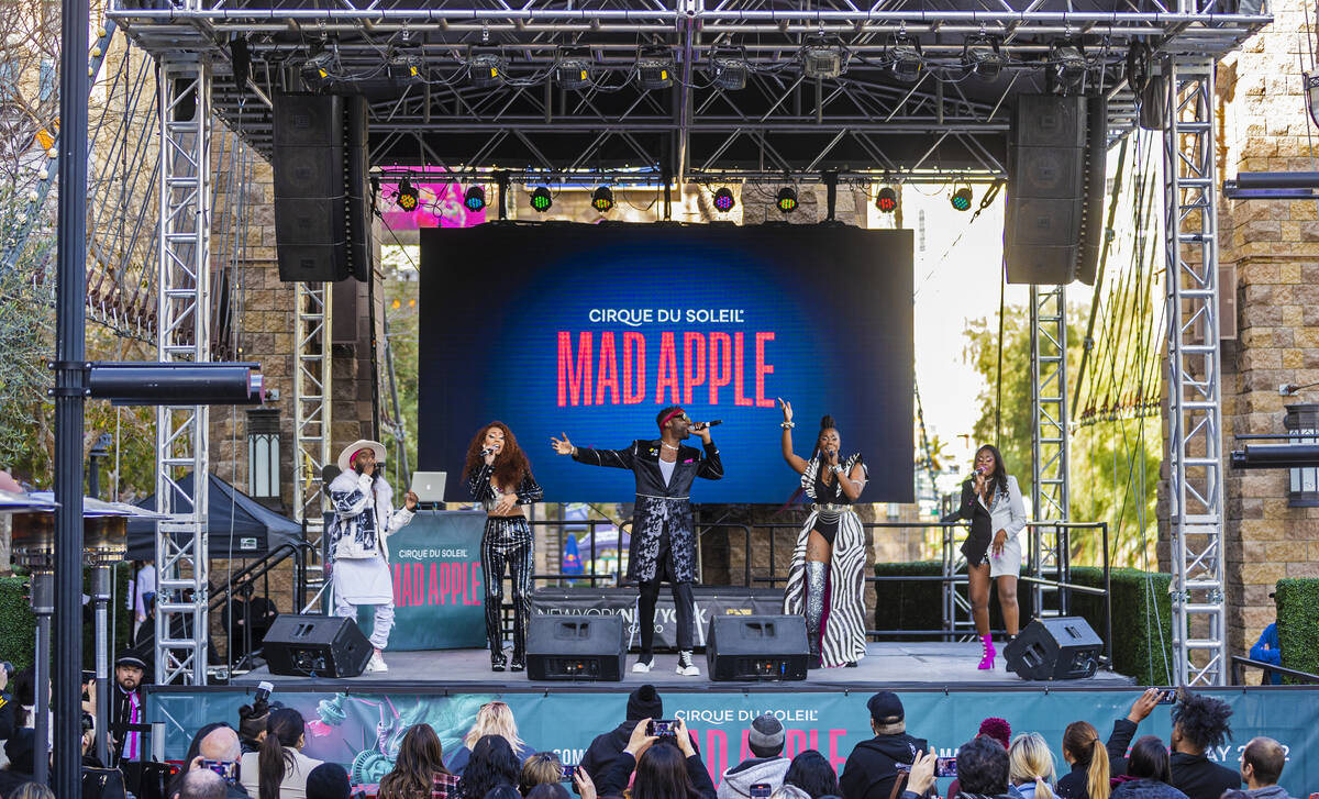 Singers in the new Cirque du Soleil show Mad Apple perform outside New York-New York during a p ...