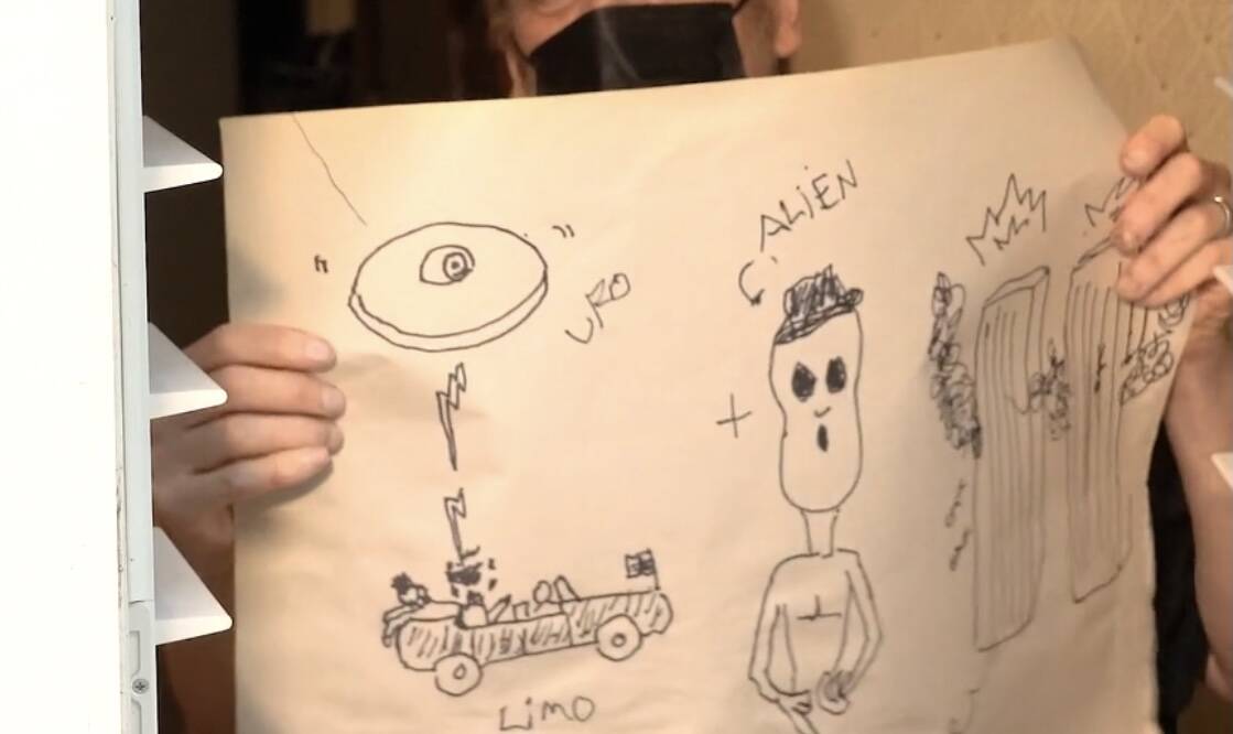 The Amazing Johnathan shows his "conspiracy theory" diagram in the developing documentary "The ...