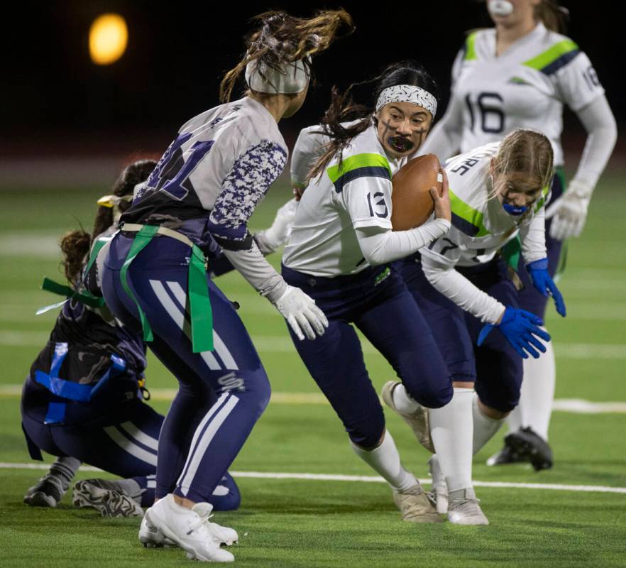 Green Valley’s Soriah Tafua (13) cuts up field past Shadow Ridge’s Soriya Ritchie ...