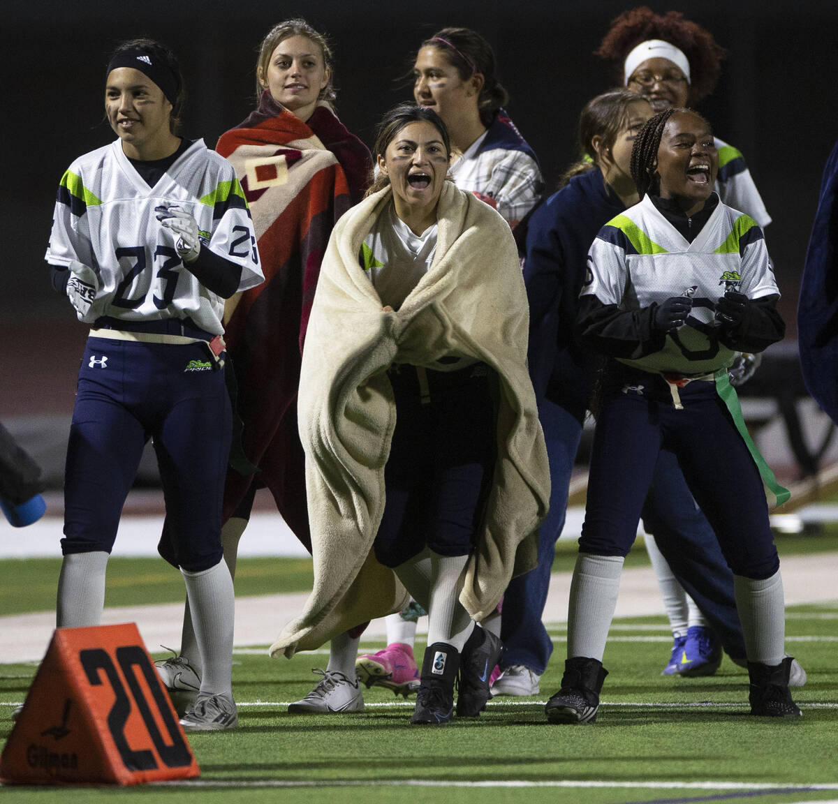 Green Valley players celebrate a first half touchdown during the first half of the flag footba ...