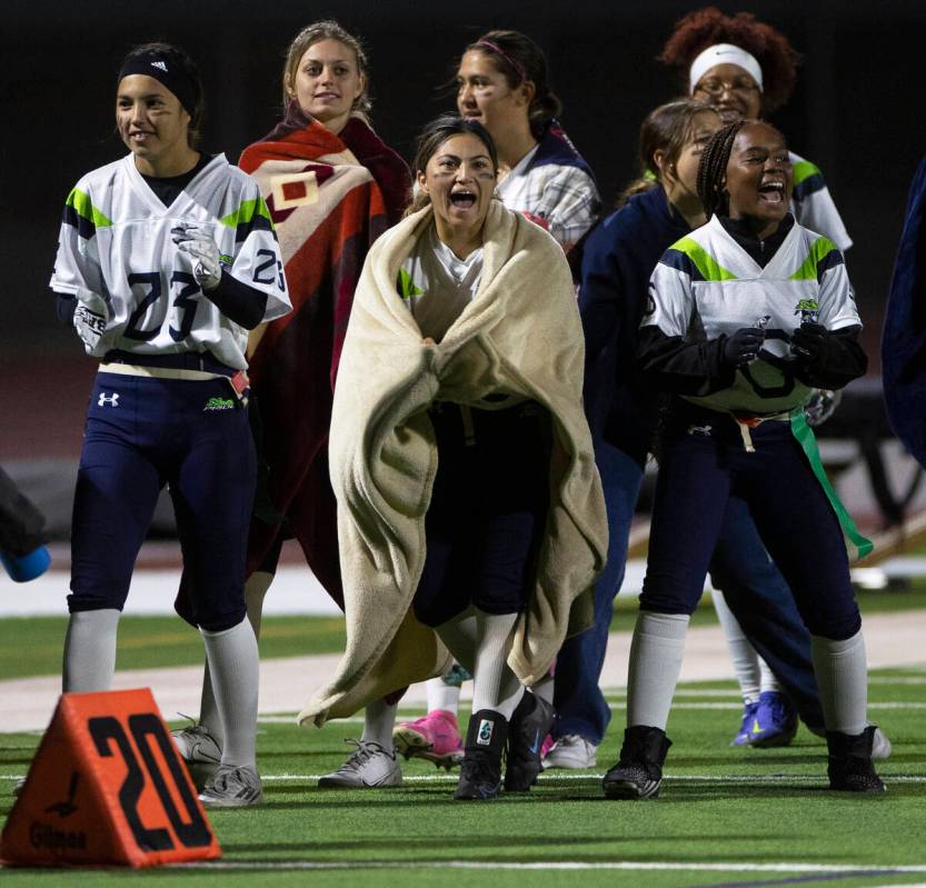 Green Valley players celebrate a first half touchdown during the first half of the flag footba ...
