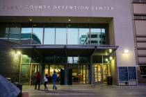 People walk outside of the Clark County Detention Center in downtown Las Vegas on Tuesday, Oct. ...